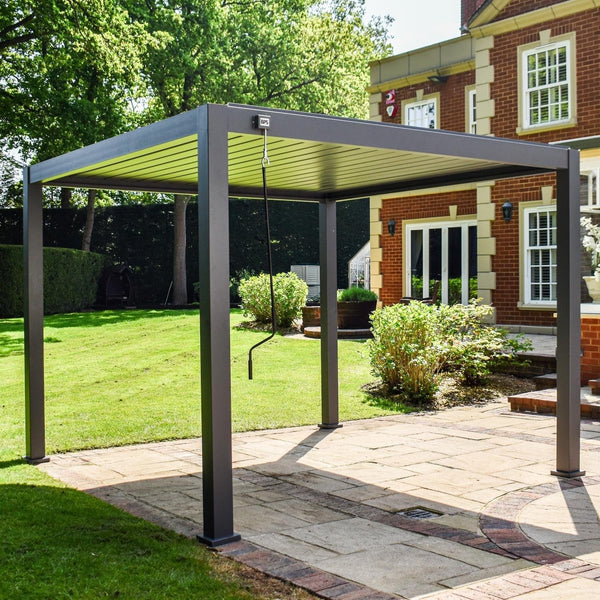 BPS Grand aluminium louvred pergola with anthracite grey frame in a UK garden