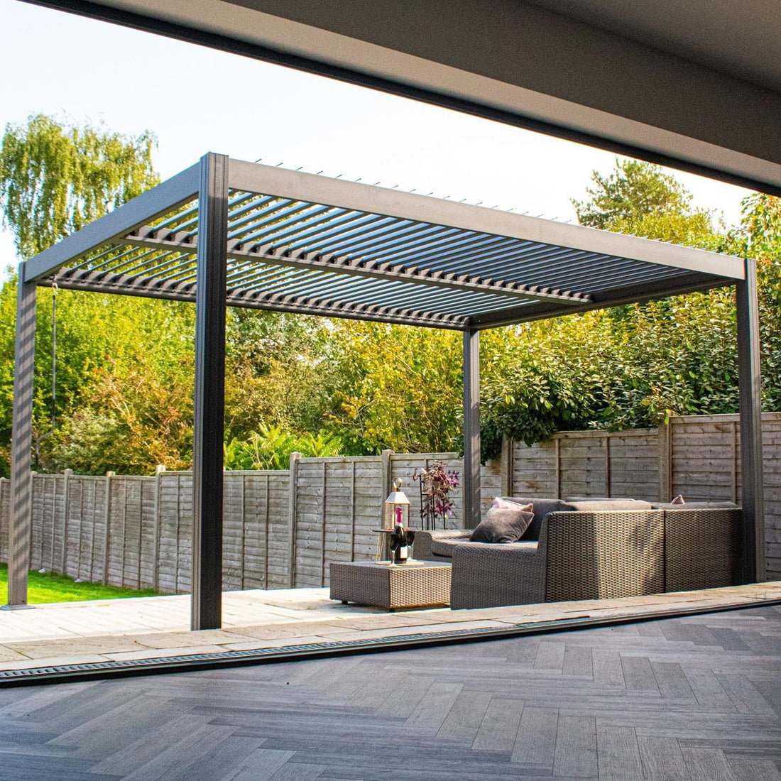 BPS Deluxe full aluminium pergola with dual-zone louvred roof in anthracite grey